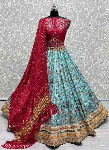 For A Fancy Designer Look,Grab These Lehenga Choli With Dupatta in Fine Colored.These Lehenga And Choli Are Silk And Dupatta Are Fabricated On Bandhani Pair.Its Beautified With Designer Printed, Embroidery Work Lace.