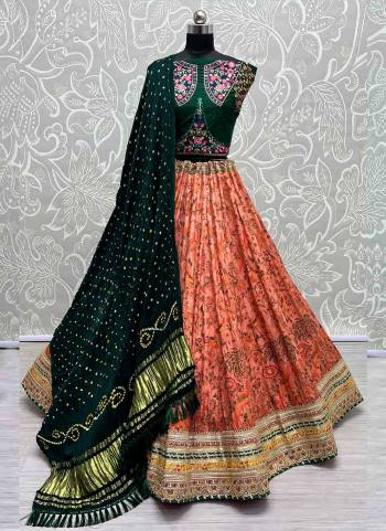 For A Fancy Designer Look,Grab These Lehenga Choli With Dupatta in Fine Colored.These Lehenga And Choli Are Silk And Dupatta Are Fabricated On Bandhani Pair.Its Beautified With Designer Printed, Embroidery Work Lace.