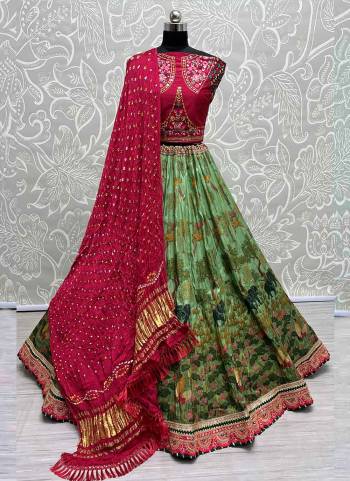 For A Fancy Designer Look,Grab These Lehenga Choli With Dupatta in Fine Colored.These Lehenga And Choli Are Silk And Dupatta Are Fabricated On Bandhani Pair.Its Beautified With Designer Printed, Embroidery Work Lace.