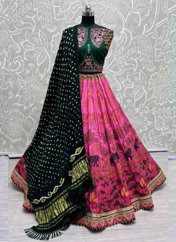 For A Fancy Designer Look,Grab These Lehenga Choli With Dupatta in Fine Colored.These Lehenga And Choli Are Silk And Dupatta Are Fabricated On Bandhani Pair.Its Beautified With Designer Printed, Embroidery Work Lace.