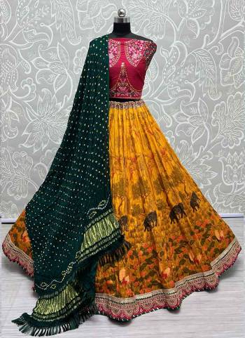 For A Fancy Designer Look,Grab These Lehenga Choli With Dupatta in Fine Colored.These Lehenga And Choli Are Silk And Dupatta Are Fabricated On Bandhani Pair.Its Beautified With Designer Printed, Embroidery Work Lace.