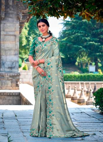 Looking These Party Wear Designer Saree in Fine Colored.These Saree Are Banarasi Silk And Blouse is Fabricated On Raw Silk.Its Beautified With Wevon Designer With Sequance,Jari,Thread Embroidery Work.