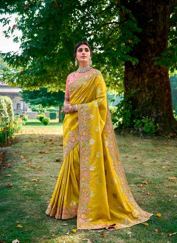 Looking These Party Wear Designer Saree in Fine Colored.These Saree Are Banarasi Silk And Blouse is Fabricated On Raw Silk.Its Beautified With Wevon Designer With Sequance,Jari,Thread Embroidery Work.