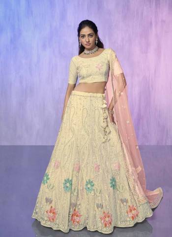 For A Designer Look,Grab These Lehenga Choli in Fine Colored.These Lehenga And Choli Are Fabricated On Net Pair With Soft Net Dupatta.Its Beautified With Heavy Designer Embroidery Work.