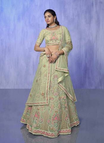 For A Designer Look,Grab These Lehenga Choli in Fine Colored.These Lehenga And Choli Are Fabricated On Net Pair With Soft Net Dupatta.Its Beautified With Heavy Designer Embroidery Work.