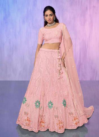 For A Designer Look,Grab These Lehenga Choli in Fine Colored.These Lehenga And Choli Are Fabricated On Net Pair With Soft Net Dupatta.Its Beautified With Heavy Designer Embroidery Work.