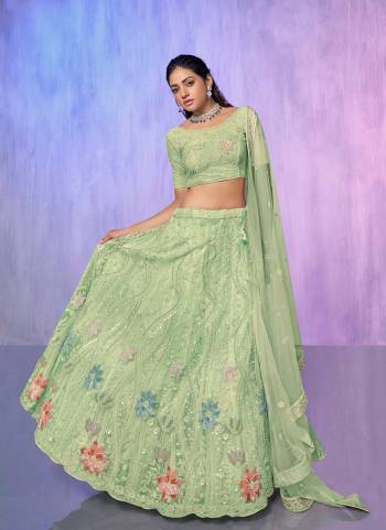 For A Designer Look,Grab These Lehenga Choli in Fine Colored.These Lehenga And Choli Are Fabricated On Net Pair With Soft Net Dupatta.Its Beautified With Heavy Designer Embroidery Work.