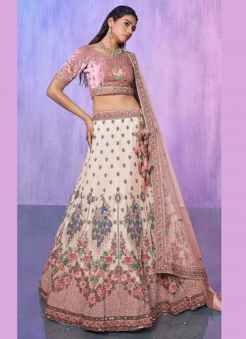 For A Designer Look,Grab These Lehenga Choli in Fine Colored.These Lehenga Are Georgette And Choli Are Fabricated On Velvet Pair With Soft Net Dupatta.Its Beautified With Heavy Designer Embroidery Work.