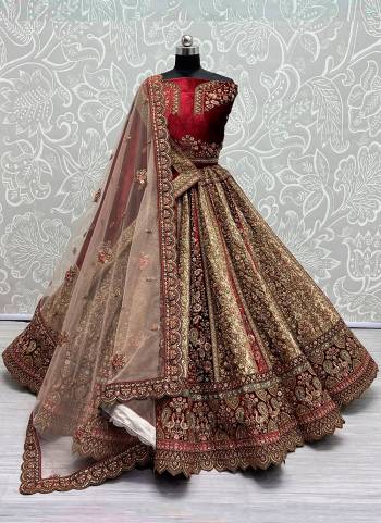 For A Fancy Designer Look,Grab These Lehenga Choli With 2 Dupatta in Fine Colored.These Lehenga And Choli Velvet And Dupatta Are Fabricated On Velvet And Soft Net.Its Beautified With Designer Thread,Sequance,Dori Embroidery Diamond Work.