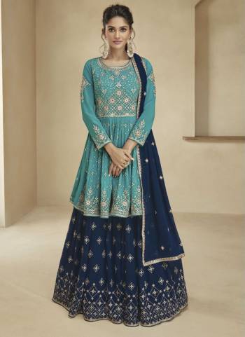 Garb These Designer Sharara Suits in Fine Colored Pair With Dupatta.These Top And Dupatta Are Fabricated On Georgette Pair With Georgette Bottom.Its Beautified With Blomming Color,Designer Floral Embroidery Work