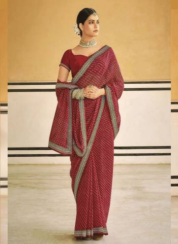 Look These Saree in Fine Colored.These Saree Are Georgette And Blouse is Fabricated On Dupion Pair.Its Beautified With Designer Bandhni Printed With Embroidery Work Lace.