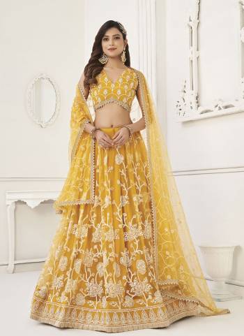 For A Different Look,Grab These Party Wear Designer Lehenga in All Over Pretty Colored Pair With Blouse And Dupatta.These Lehenga Choli And Dupatta is All Over Butterfly Net Base Fabric With Designer Cotton Thread,Sequance Embroidery Work.