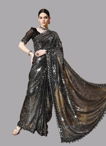 Attrective Look These Party Wear Saree in Fine Colored.These Saree Are Georgette And Blouse is Mono Banglori Fabricated.Its Beautified With Designer Heavy Sequance Embroidery Work Lace Border.