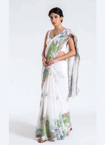 Garb These Party Wear Saree in Fine Colored.These Saree Are Linen And Blouse is Fabricated On Linen.Its Beautified With Designer Digital Printed.