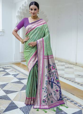 Attrective Looking These Party Wear Saree in Fine Colored.These Saree And Blouse is Fabricated On Soft Kanjivaram Silk.Its Beautified With Paithani Wevon Designer.