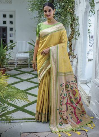 Attrective Looking These Party Wear Saree in Fine Colored.These Saree And Blouse is Fabricated On Soft Kanjivaram Silk.Its Beautified With Paithani Wevon Designer.