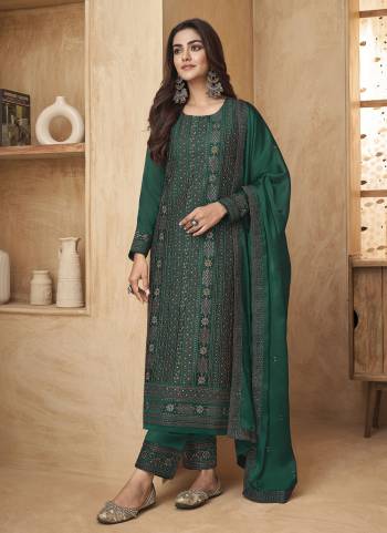 Attrective Looking These Party Wear Suit in Fine Colored Pair With Bottom And Dupatta.These Top And Dupatta Are Fabricated On Black Rangoli Pair With Black Rangoli Bottom.Its Beautified With Dull Santoon Inner.Its Beautified With Designer Heavy Embroidery With Diamond Work.