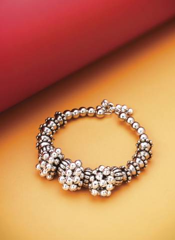 Looking These Beautifil Silver Colored Bracelet.These Bracelet is Come Alloy Material And Beautified With Oxidised Beads Work.