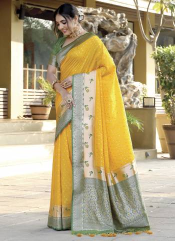 Garb These Festive Wear Saree in Fine Colored.These Saree And Blouse is Fabricated On Soft Banarasi Silk.Its Beautified With Paithani Weavon Jari Designer.