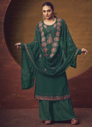 Attrective Looking These Sharara Suit in Fine Colored Pair With Bottom And Dupatta.These Top Are Georgette And Dupatta Are Fabricated On Georgette Pair With Santoon Bottom.Its Beautified With Designer Heavy Thread Embroidery Work.