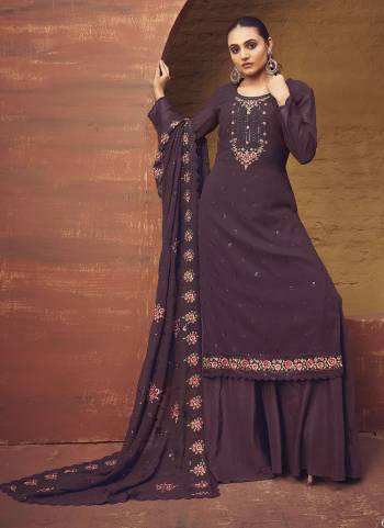 Attrective Looking These Sharara Suit in Fine Colored Pair With Bottom And Dupatta.These Top Are Georgette And Dupatta Are Fabricated On Georgette Pair With Santoon Bottom.Its Beautified With Designer Heavy Thread Embroidery Work.