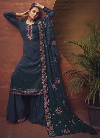 Attrective Looking These Sharara Suit in Fine Colored Pair With Bottom And Dupatta.These Top Are Georgette And Dupatta Are Fabricated On Georgette Pair With Santoon Bottom.Its Beautified With Designer Heavy Thread Embroidery Work.