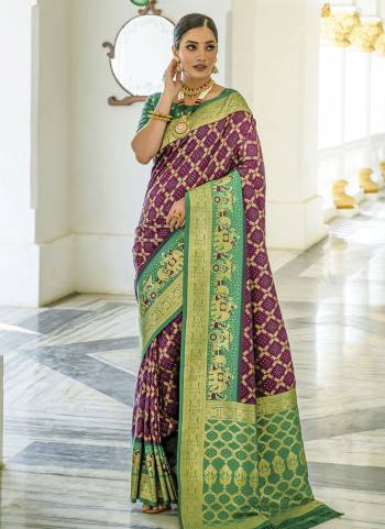 Attrective Looking These Party Wear Saree in Fine Colored.These Saree And Blouse is Fabricated On Soft Banarasi Silk.Its Beautified With Bandhani Wevon Designer.