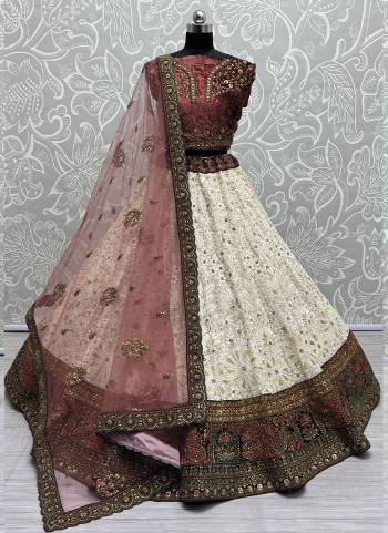 For A Fancy Designer Look,Grab These Lehenga Choli With Dupatta in Fine Colored.These Lehenga And Choli Are Georgette And Dupatta Are Fabricated On Soft Net Pair.Its Beautified With Designer Metalic Jari, Sequance,Dori Embroidery,Diamond Lace Work.