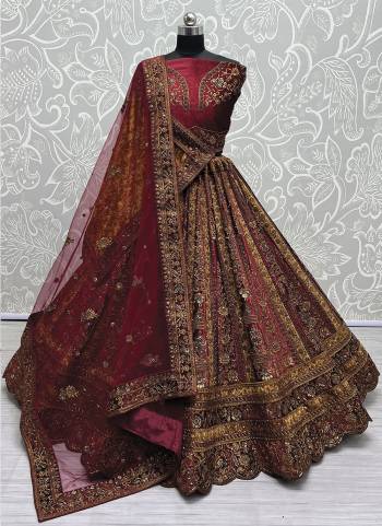 For A Fancy Designer Look,Grab These Lehenga Choli With 2 Dupatta in Fine Colored.These Lehenga And Choli Are Velvet And Dupatta Are Fabricated On Soft Net And Velvet Pair.Its Beautified With Designer Multy Thread,Sequance,Dori,Jari Embroidery,Diamond Work.