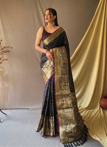 Garb This Partywear Saree Paired With Blouse.This Saree And Blouse Are Soft Silk Based Fabric With Weaving Jari Heavy Designer. Buy This Pretty Saree Now.