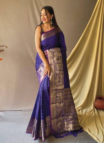 Garb This Partywear Saree Paired With Blouse.This Saree And Blouse Are Soft Silk Based Fabric With Weaving Jari Heavy Designer. Buy This Pretty Saree Now.