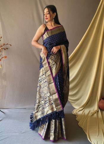 Garb This Partywear Saree Paired With Blouse.This Saree And Blouse Are Soft Silk Based Fabric With Weaving Jari Heavy Designer. Buy This Pretty Saree Now.