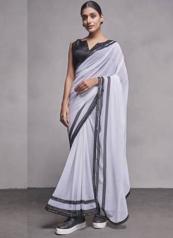 Looking These Party Wear Saree in Fine Colored.These Saree Are Georgette And Blouse is Fabricated On Fancy Art Silk Pair.Its Beautified With Solid Designer.