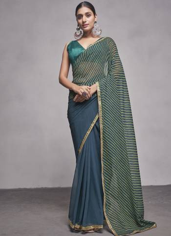 Looking These Party Wear Saree in Fine Colored.These Saree Are Georgette And Blouse is Fabricated On Fancy Art Silk Pair.Its Beautified With Solid Designer.