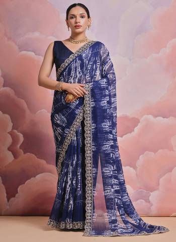 Grab These Festive Wear Saree in Fine Colored.These Saree is Fabricated On Georgette Pair With Mono Banglori Blouse.Its Beautified Designer Printed With Sequance,Coding Work Lace Border.