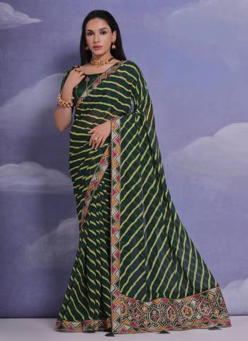 Grab These Festive Wear Saree in Fine Colored.These Saree is Fabricated On Georgette Pair With Mono Banglori Blouse.Its Beautified Designer Laheriya Printed With Multy Thread,Sequance,Coding Work Lace Border With Blouse.