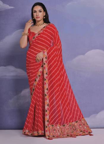 Grab These Festive Wear Saree in Fine Colored.These Saree is Fabricated On Georgette Pair With Mono Banglori Blouse.Its Beautified Designer Laheriya Printed With Multy Thread,Sequance,Coding Work Lace Border With Blouse.