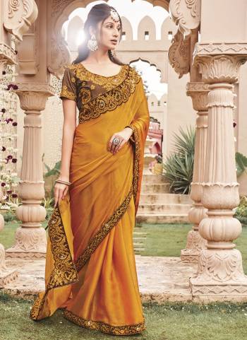 Looking These Fancy Party Wear Saree in Fine Colored.These Saree Are Shimmer And Blouse is Fabricated On Art Silk Pair.Its Beautified With Blooming Color With Heavy Embroidery Work Border Blouse.