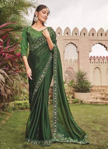 Looking These Fancy Party Wear Saree in Fine Colored.These Saree Are Shimmer And Blouse is Fabricated On Art Silk Pair.Its Beautified With Blooming Color With Heavy Embroidery Work Border Blouse.