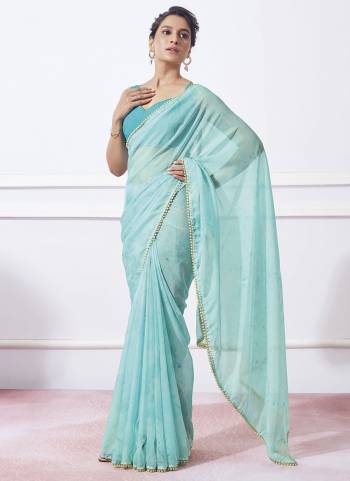 Garb These Party Wear Saree in Fine Colored.These Saree Are Organza And Blouse is Fabricated On Fancy Art Silk Pair.Its Beautified With Prizam Printed Designer With Moti Lace.