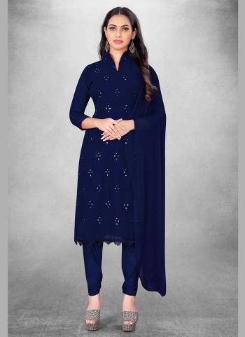 Garb This Suits In Lovely Color.Its Pretty Top Is Georgette Based Paired Bottom Santoon And Nazmin Fabricated Dupatta Are Designer Embroidery Work. Which Gives An Attractive To The Dress.