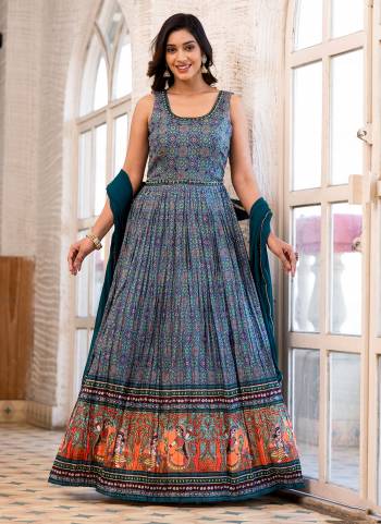 Attrective These Party Wear Gown With Dupatta in Fine Colored.These Gown Are Fabricated On Dolla Silk Pair With Nazmin Dupatta.Its Beautified With Designer Printed With Real Mirror Hand Work.