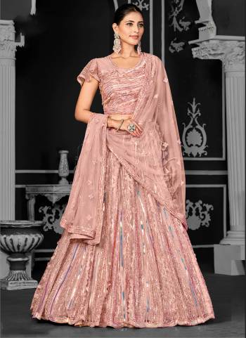 For A Designer Look,Grab These Lehenga Choli in Fine Colored.These Lehenga And Dupatta Are Fabricated On Net Pair With Net Blouse.Its Beautified With Designer Cord Floral Sequance Embroidery With Applique Work.