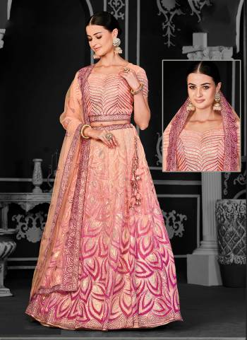 For A Designer Look,Grab These Lehenga Choli in Fine Colored.These Lehenga And Dupatta Are Fabricated On Net Pair With Net Blouse.Its Beautified With Designer Cord Floral Sequance Embroidery With Applique Work.