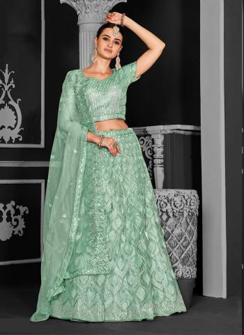 For A Designer Look,Grab These Lehenga Choli in Fine Colored.These Lehenga And Dupatta Are Fabricated On Net Pair With Net Blouse.Its Beautified With Designer Cord Floral Sequance Embroidery With Applique Work.