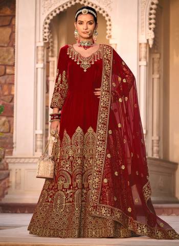 Garb These Anarkali Suit in Fine Colored Pair With Bottom And Dupatta.These Top Are Velvet And Dupatta Are Fabricated On Butterfly Net Pair With Micro Bottom.Its Beautified With Designer Heavy Jari Embroidery Work.