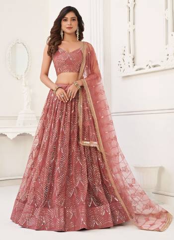 For A Different Look,Grab These Party Wear Designer Lehenga in All Over Pretty Colored Pair With Blouse And Dupatta.These Lehenga Choli And Dupatta is All Over Butterfly Net Base Fabric With Designer Thread,Sequance,Real Mirror Embroidery Work.