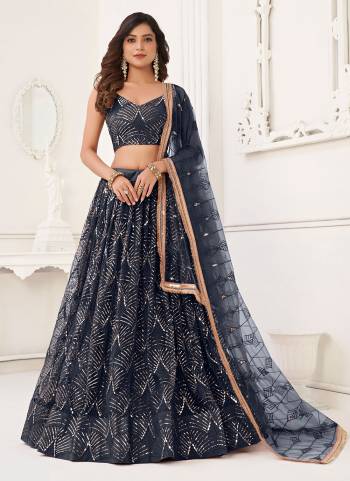 For A Different Look,Grab These Party Wear Designer Lehenga in All Over Pretty Colored Pair With Blouse And Dupatta.These Lehenga Choli And Dupatta is All Over Butterfly Net Base Fabric With Designer Thread,Sequance,Real Mirror Embroidery Work.