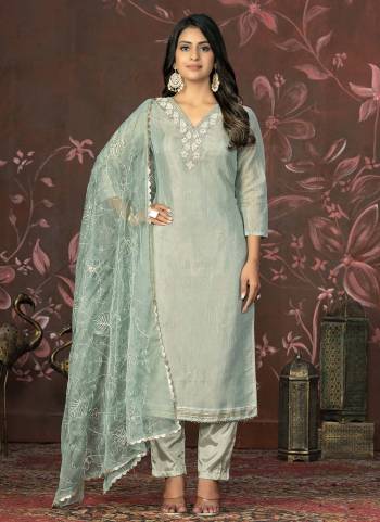 Garb These Suit in Fine Colored Pair With Bottom And Dupatta.These Top Are Simmer Cotton And Dupatta Are Fabricated On Organza Pair With Santoon Bottom.Its Beautified With Designer Hand Work.