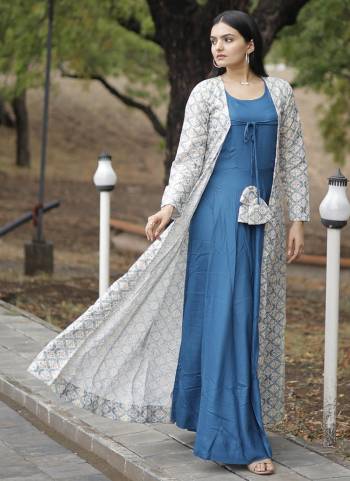 Atrective These Beautiful Looking Readymade Long Gown With Shrug.These Gown is Fabricated On Rayon And Georgette Shrug.Its Beautified With Designer Crochet Embroidery Work.